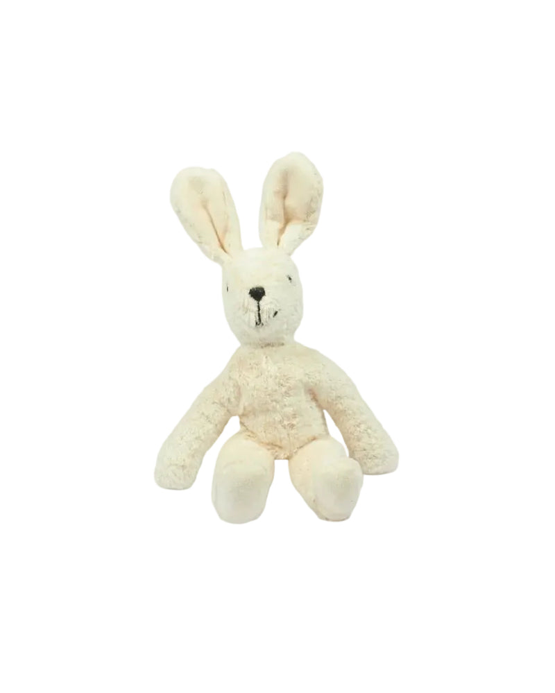White plush bunny toy on a white background