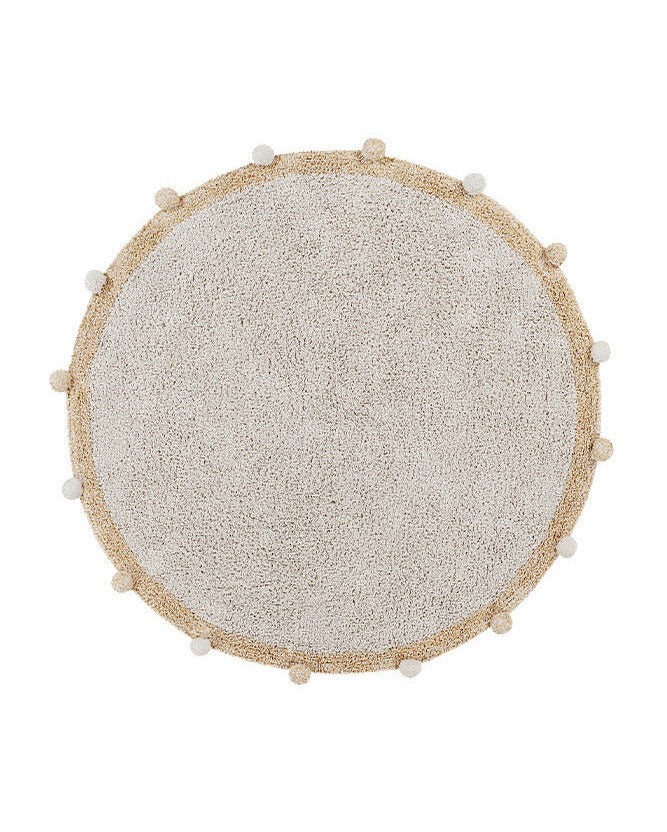 Round textured rug with bead border on a white background