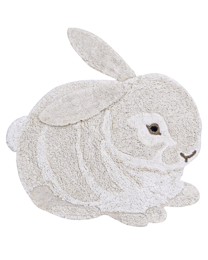 White rabbit-shaped bath mat on a white background