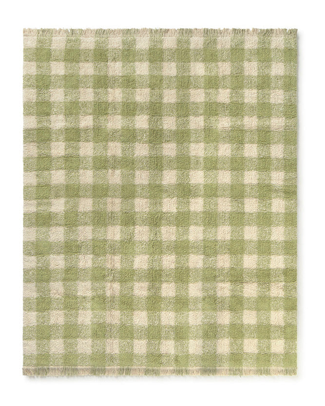 Green and white checkered rug on a white background