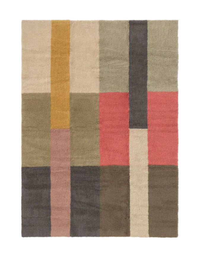 Rectangular rug with a geometric pattern of multicolored squares on a white background