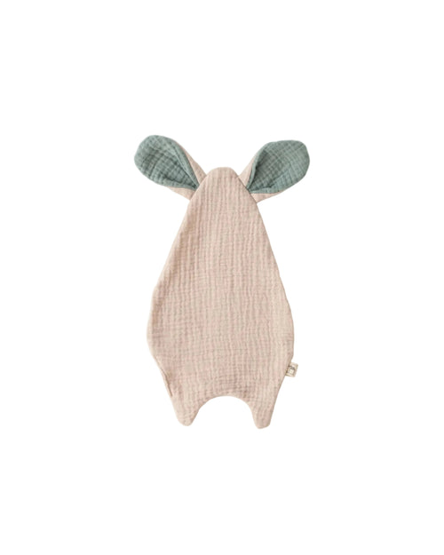Baby lovie with green bunny ears on a light gray background